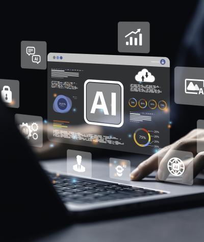 A person's hands on a laptop keyboard with various windows and icons hovering in the air above it that say "AI"