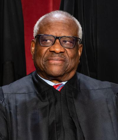 Portrait of Clarence Thomas looking to the side